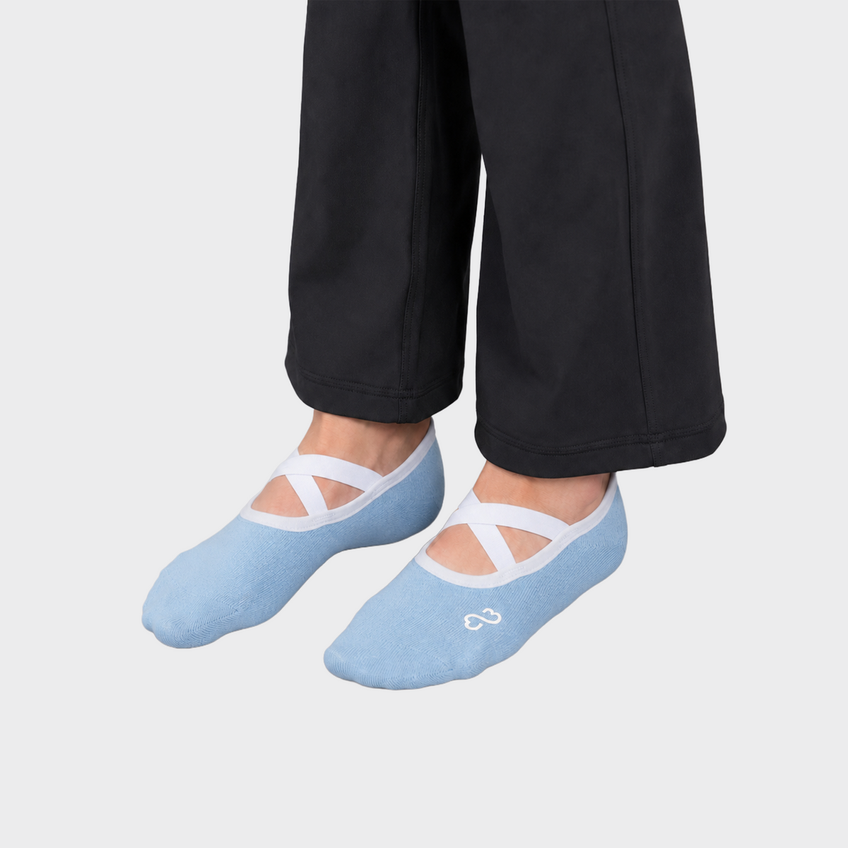 Bodiwealth blue cross strap yoga socks, model hero