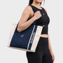 Bodiwealth Deep Blue yoga tote bag with mat holder, model hero