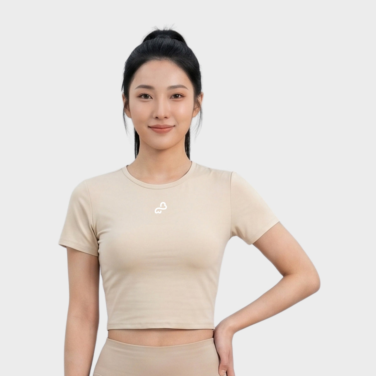Bodiwealth Cream athletic tee, clean model front