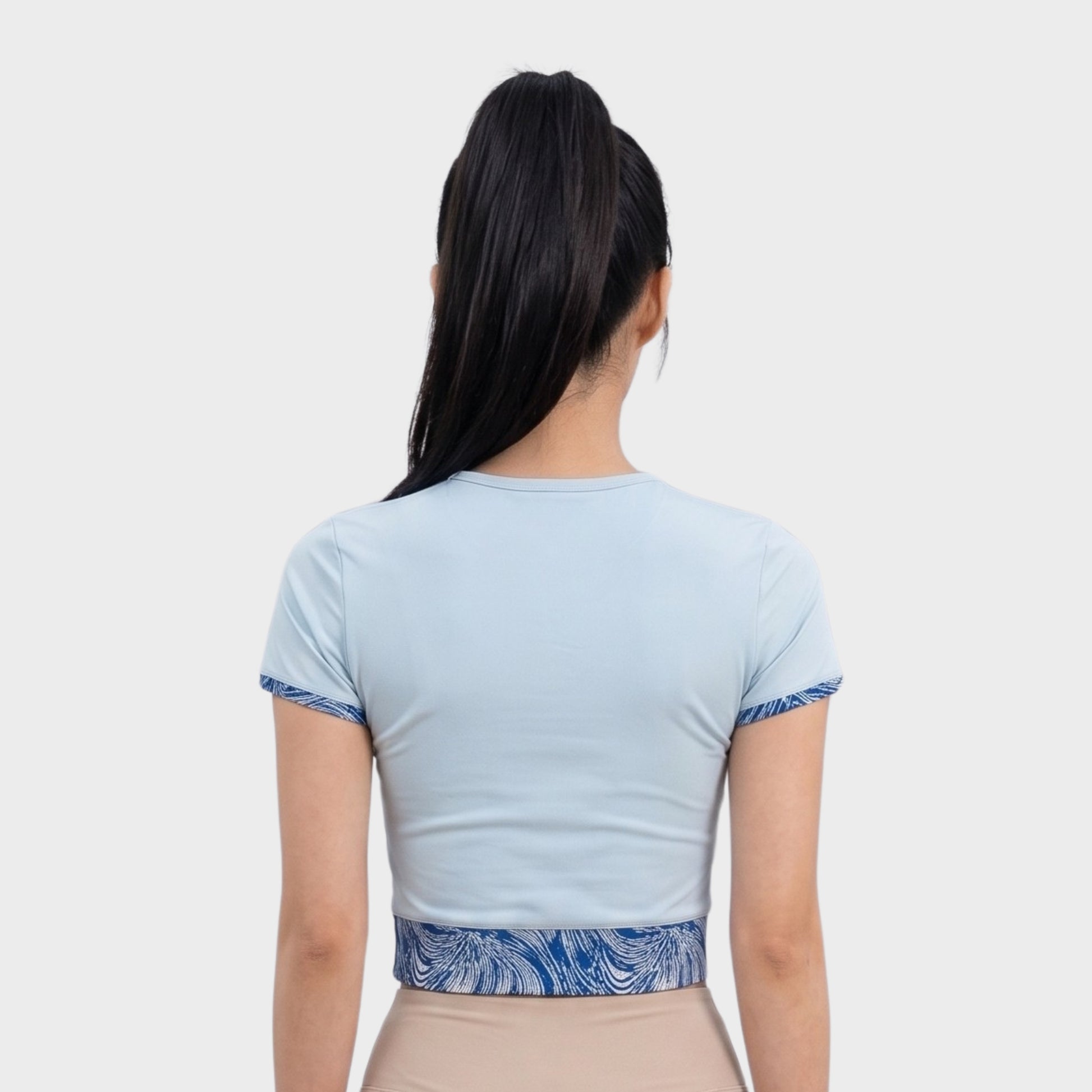 Bodiwealth Light Blue sports tee, model back