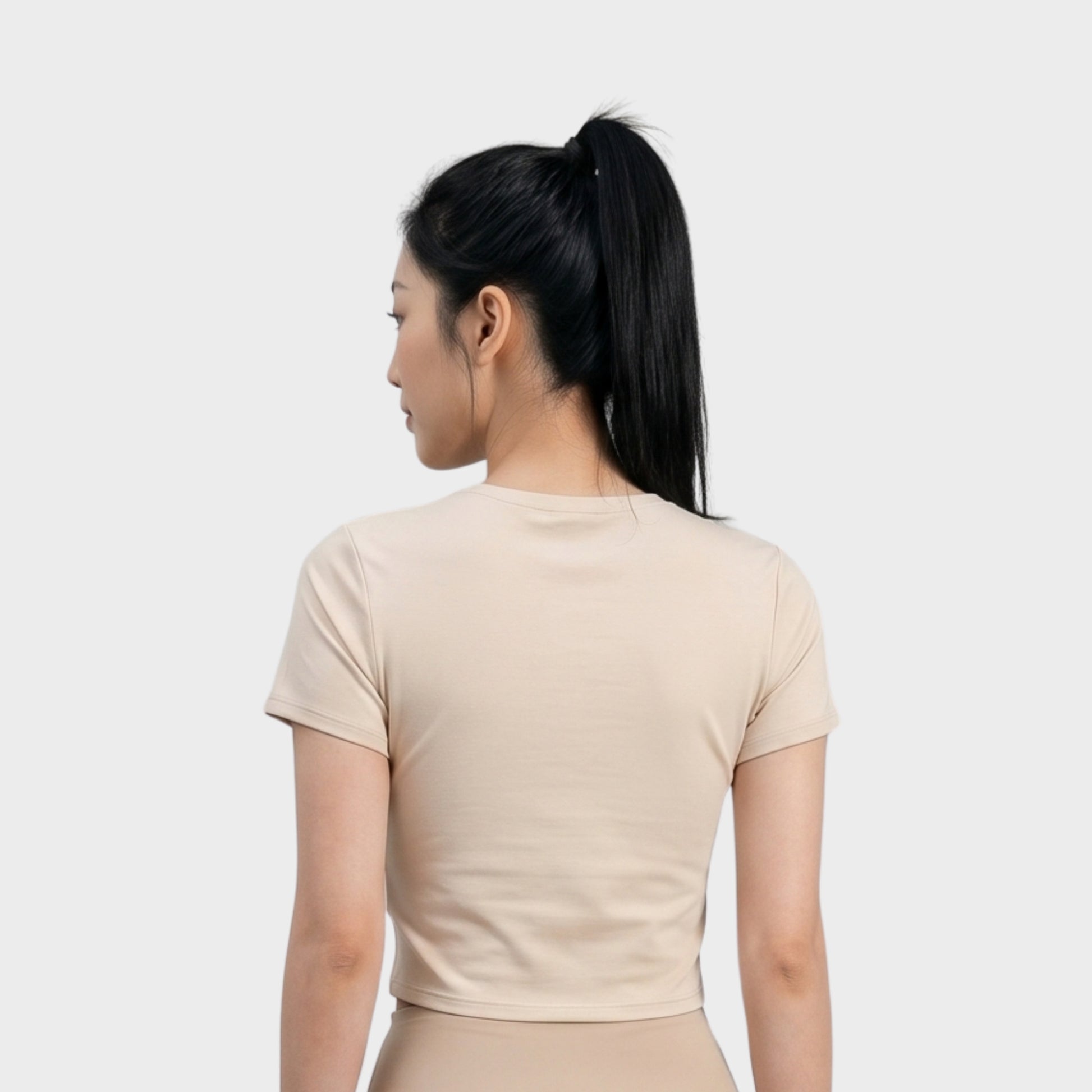 Bodiwealth Cream athletic tee, model back