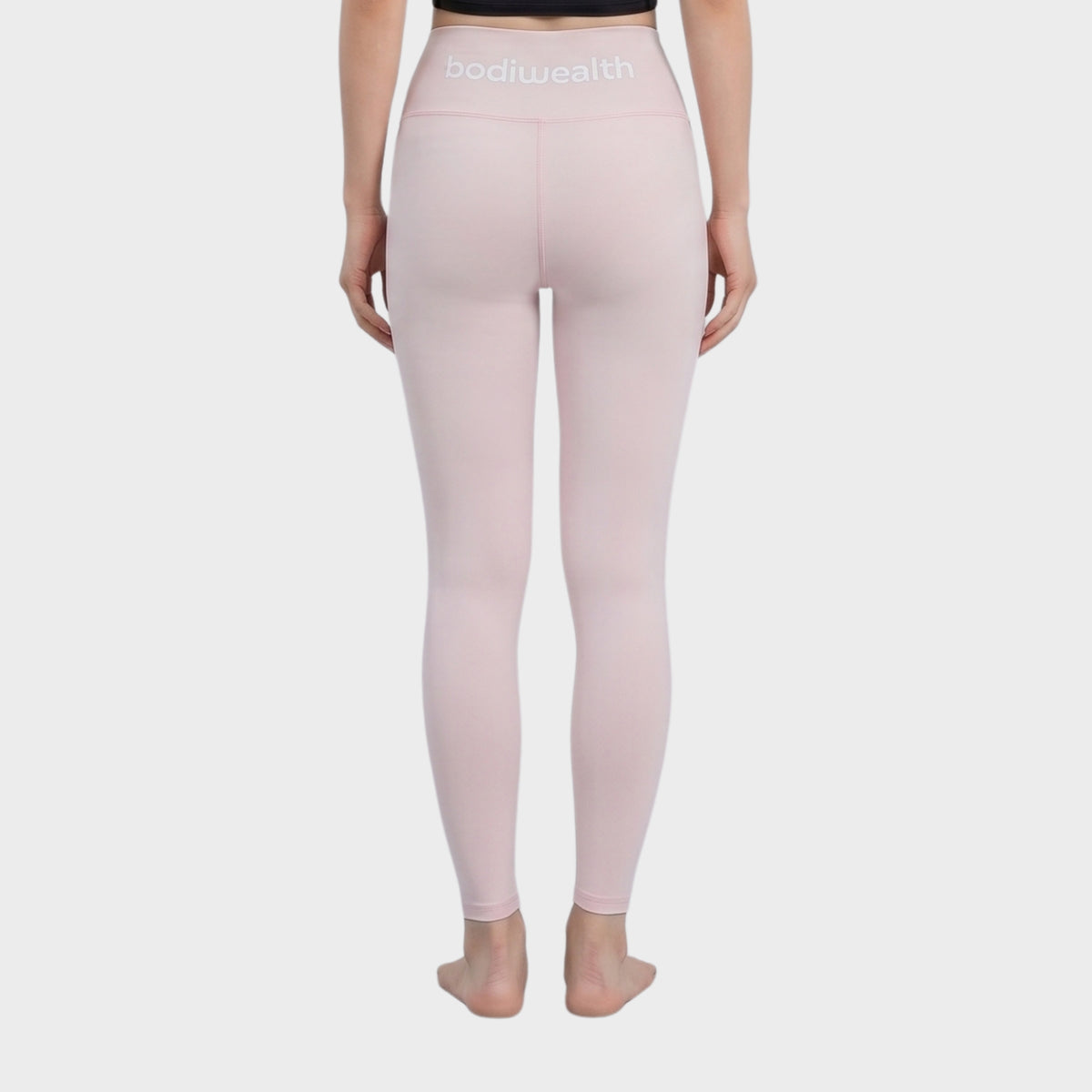 Bodiwealth Light Pink high waist yoga leggings, model back