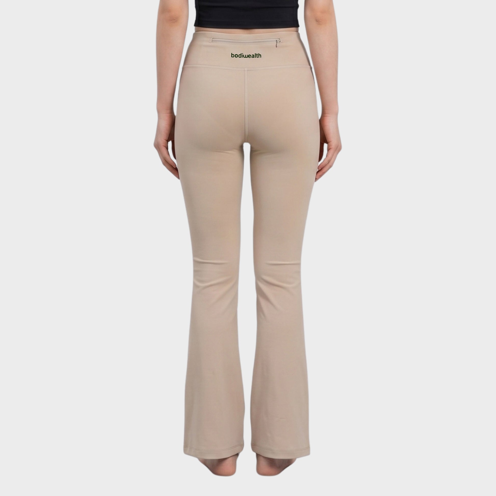 Bodiwealth Cream yoga pants, model back