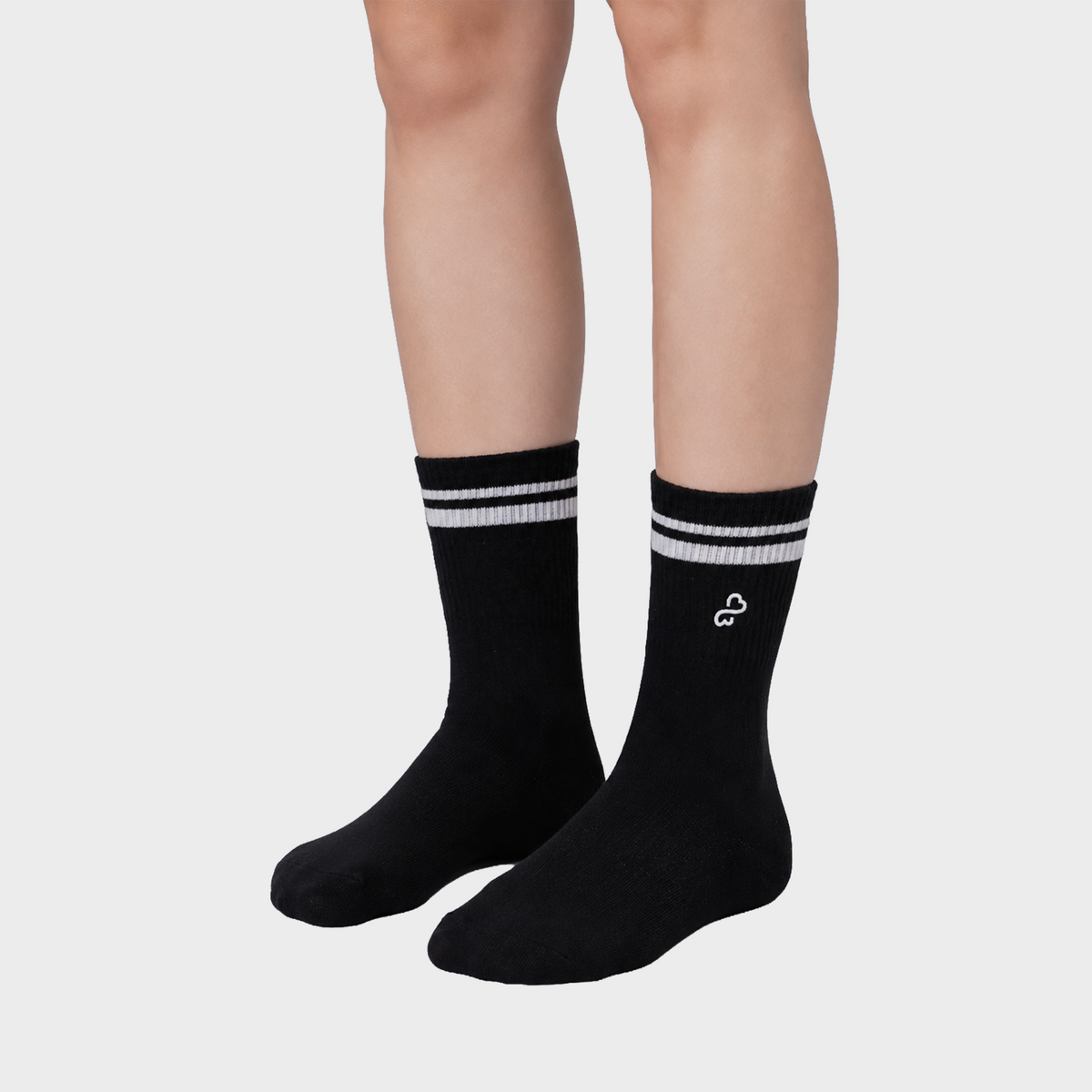 Bodiwealth Black striped crew socks, three quarter side on model