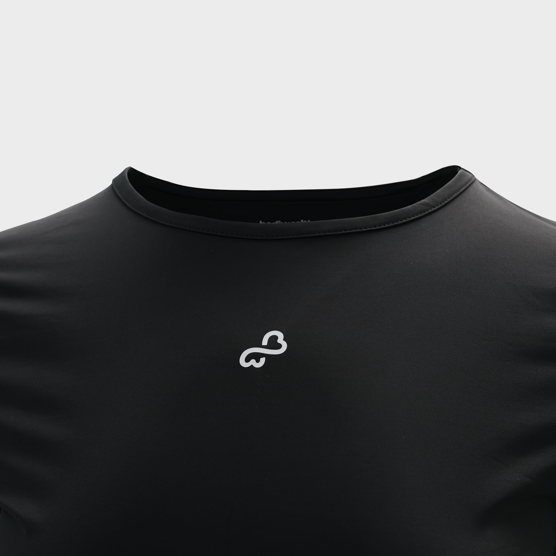 Bodiwealth Black athletic tee, front logo detail