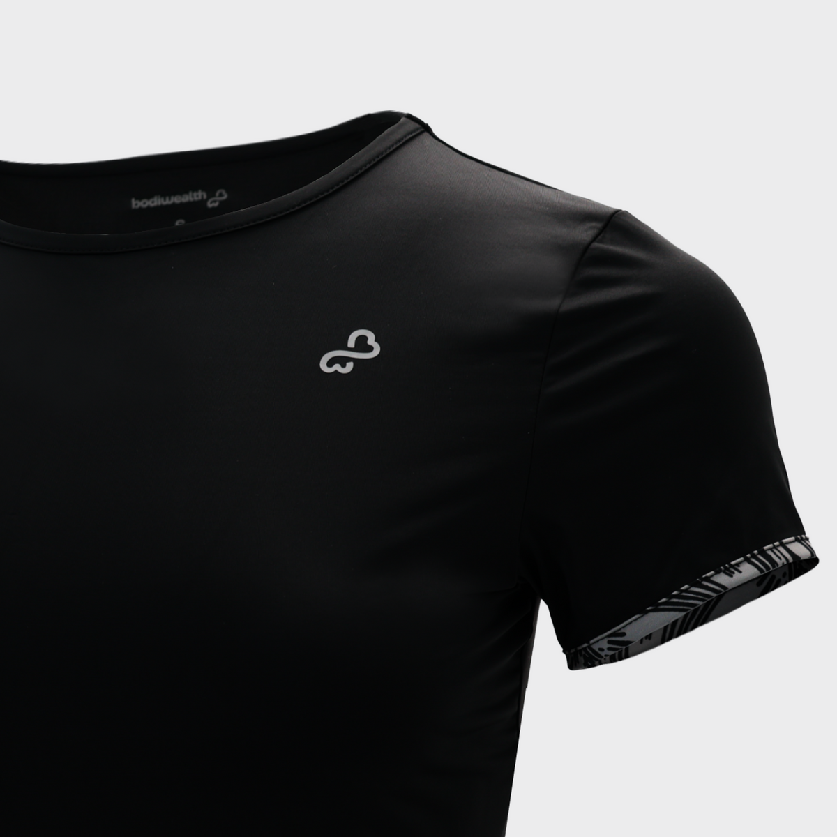 Bodiwealth Black sports tee, front logo detail