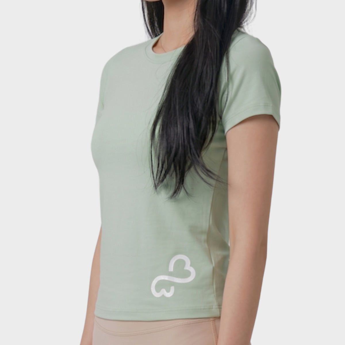 Bodiwealth Light Sage sports tee, model side