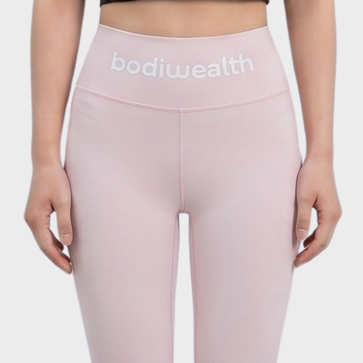 Bodiwealth Light Pink high waist yoga leggings, model front detail