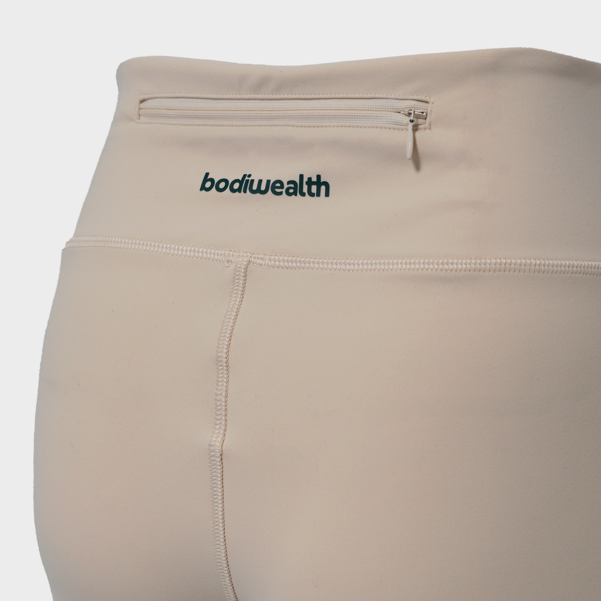 Bodiwealth Cream yoga pants, back pocket and construction detail