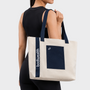 Bodiwealth Deep Blue yoga tote bag with mat holder, back on model