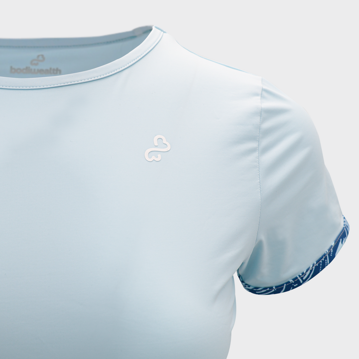 Bodiwealth Light Blue sports tee, secondary front construction detail