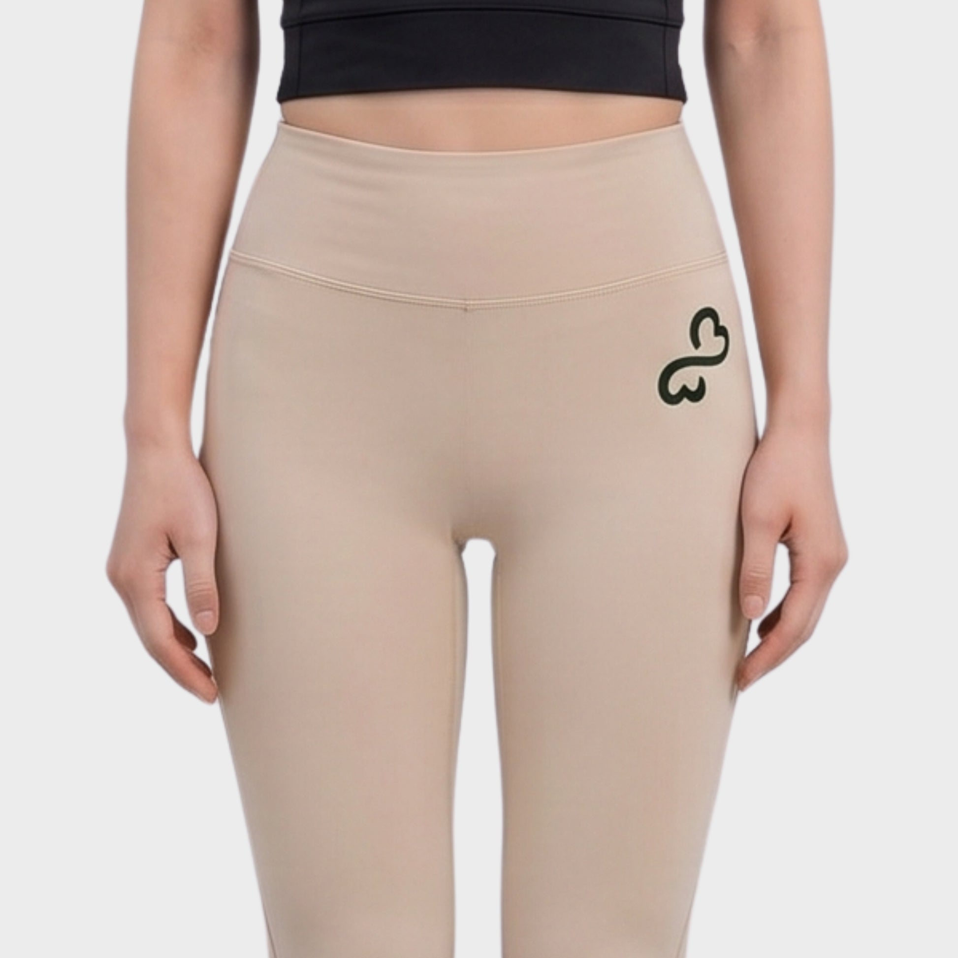 Bodiwealth Cream yoga pants, model front detail