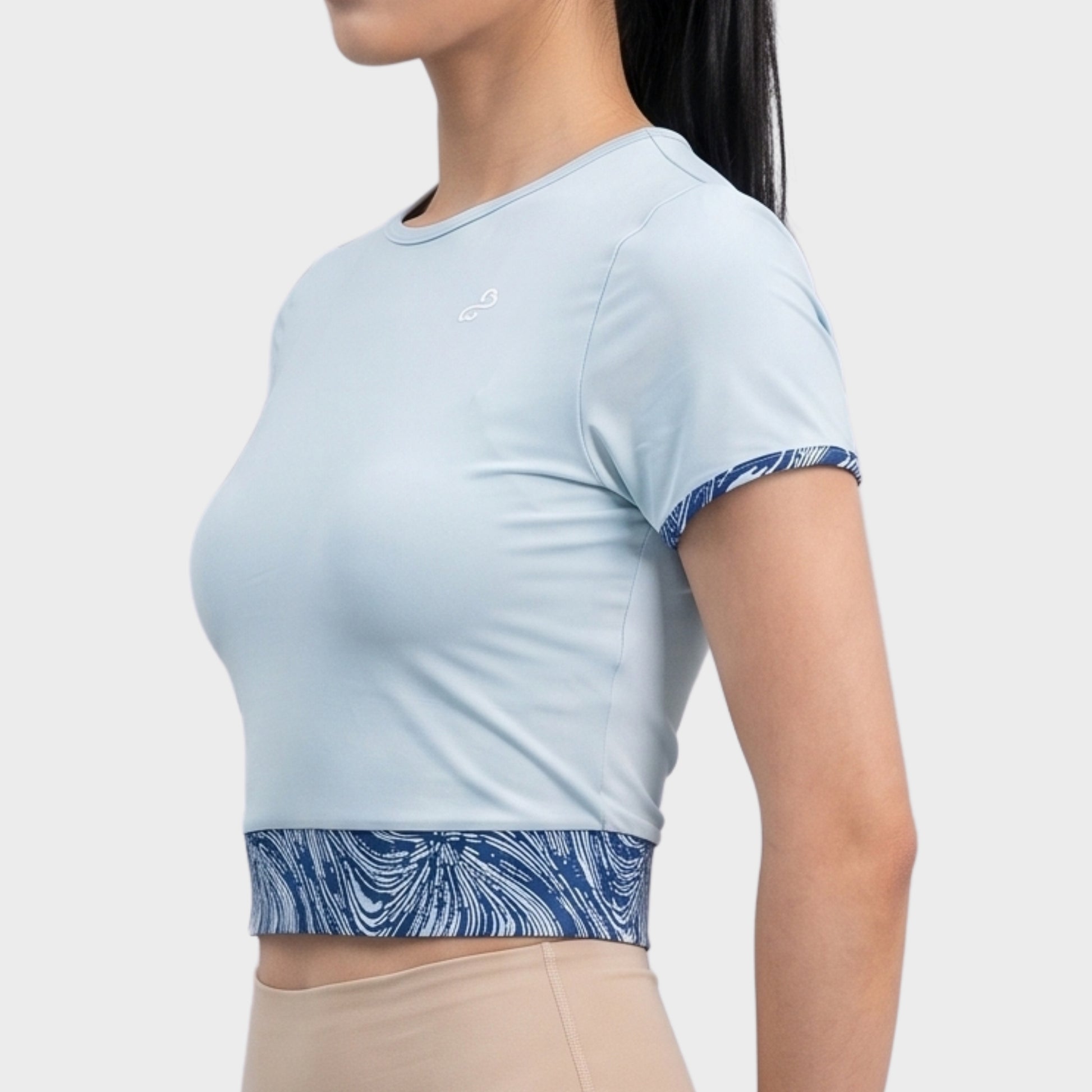 Bodiwealth Light Blue sports tee, model side